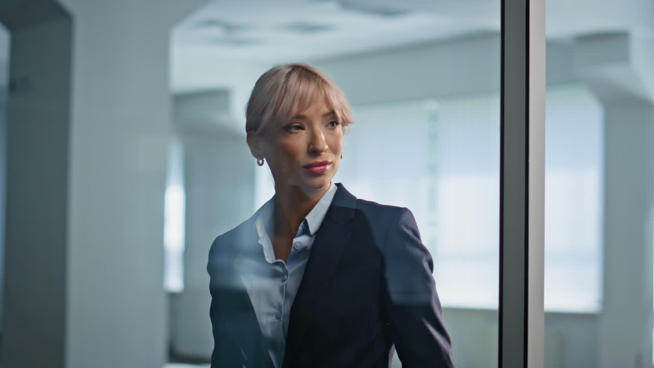 Confident businesswoman standing office hall closeup. Ambitious leader posing