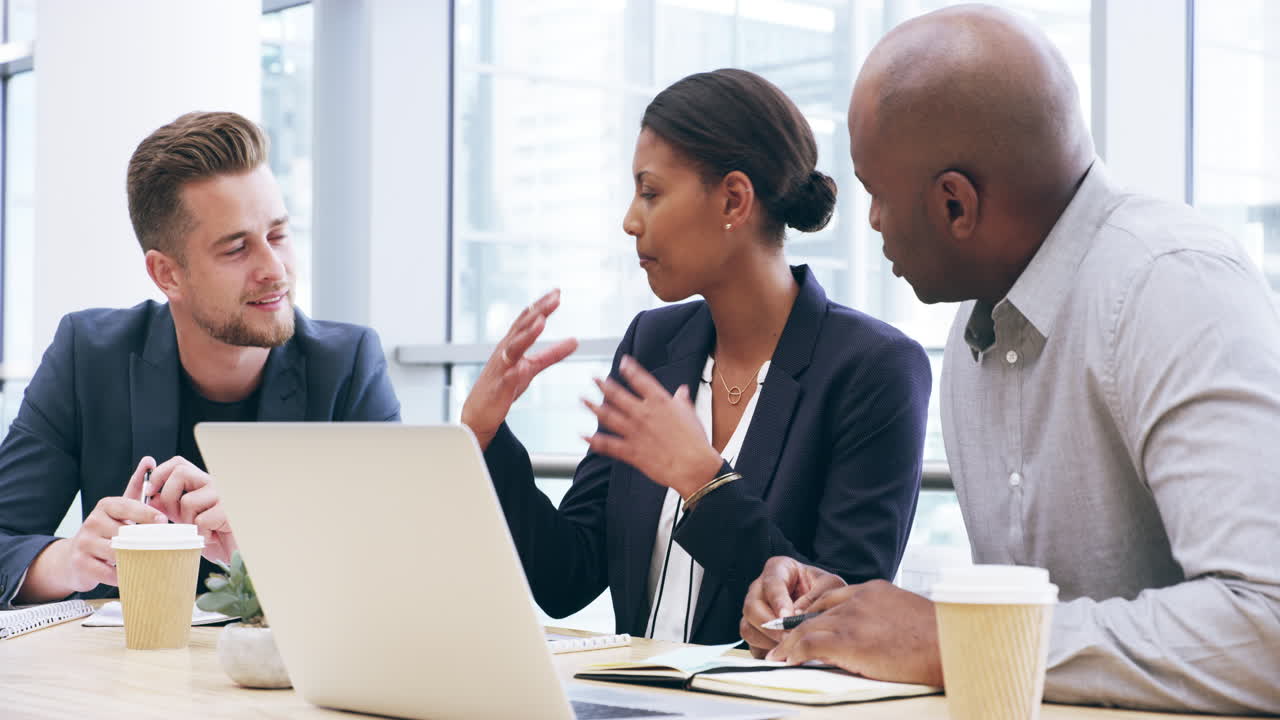 three business colleagues working together