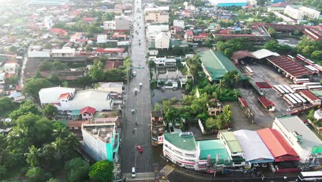 Aerial-view-above-flooded-rain-water-after-tropical-storm,-highways-over-flowing,-vehicles-driving-slowly