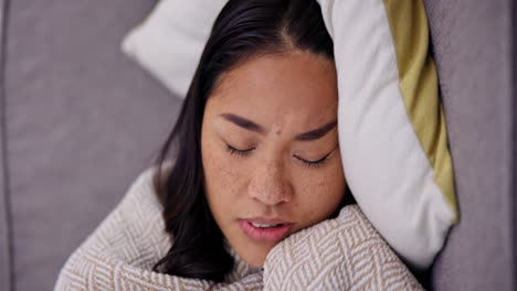 woman sleeping on sofa, tired