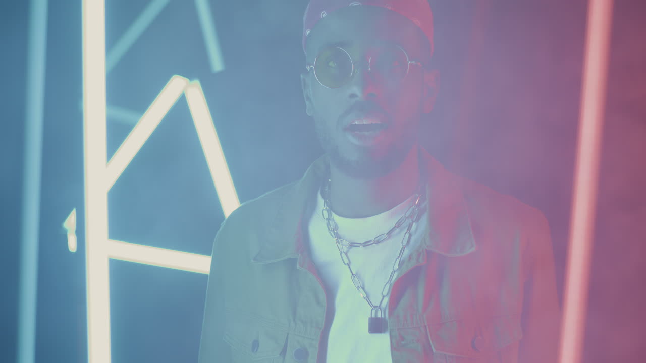 Stylish Man in Neon Lighting