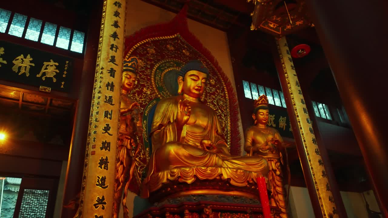 Golden Buddha Statue in Temple Sanctuary