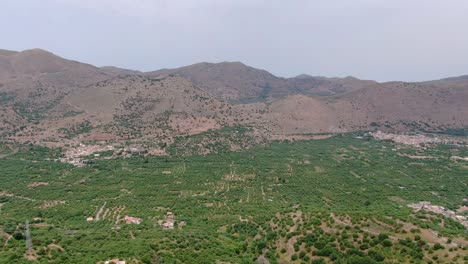 Agriculture-fields-and-mountains-in-Lasithi,-Crete