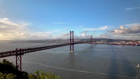 slowmotion video of 25th april bridge over tagus river in portugal