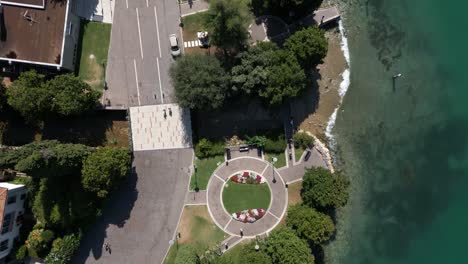 Top-down-aerial-view-of-Garda-harbor,-Lake-Garda