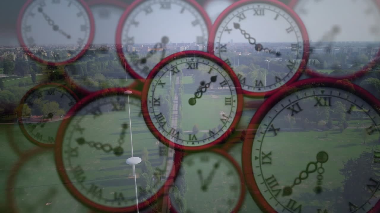 Playhead moving causing red-rim clocks ticking and advancing hands to show time over aerial park
