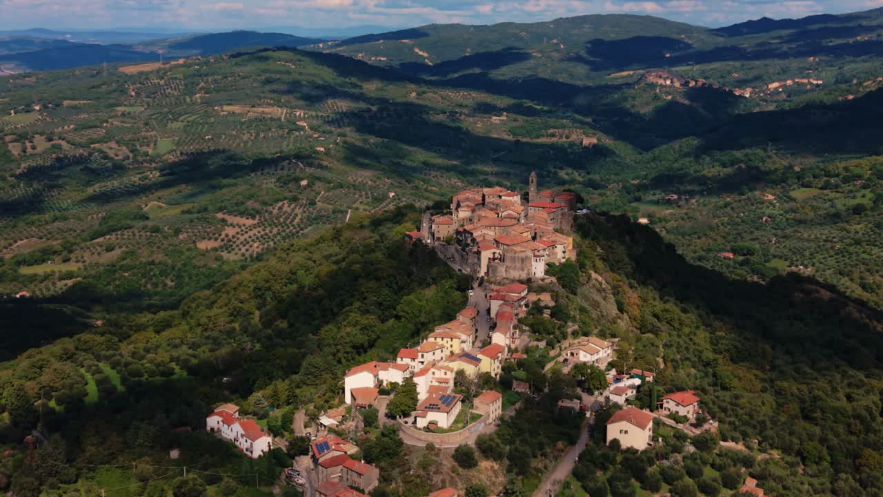 Montegiovi old town village on a hill surrounded by olive trees, vineyards and open valleys. Tuscany