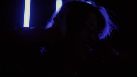 woman with purple hair in neon light