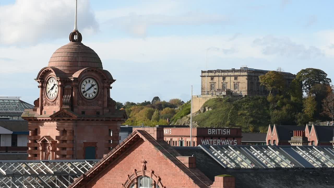Close-up view of the historic Nottingham Railway Station Clock Tower, a landmark in the heart of Nottingham city centre, England, showcasing its architectural details and heritage design