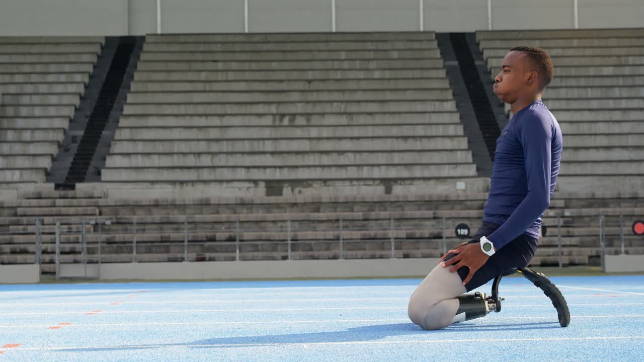 Disabled athletic relaxing on a running track 4k