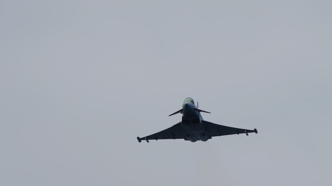 Combat jet flying directly at the camera