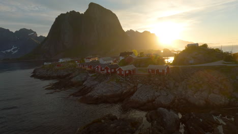 Idyllic-fishing-village-Hamnoy-during-midnight-sun-in-Lofoten,-Norway,-Pedestal-Shot