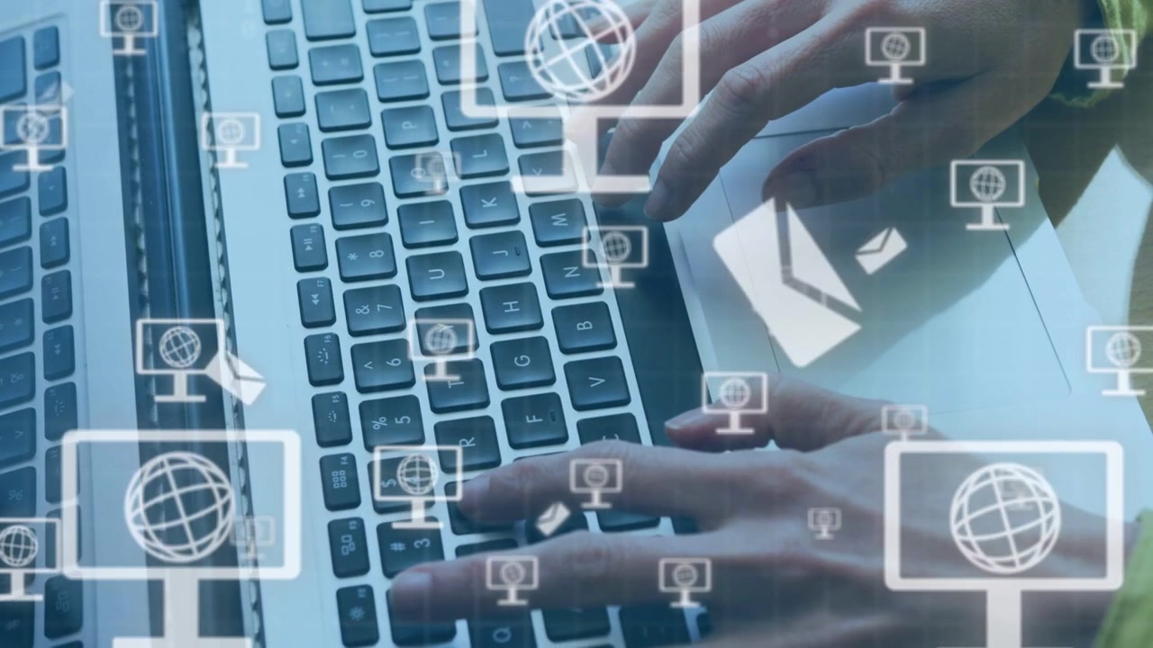 Tech user typing on laptop keyboard sending mail and growing globe and mail icons obscuring hands