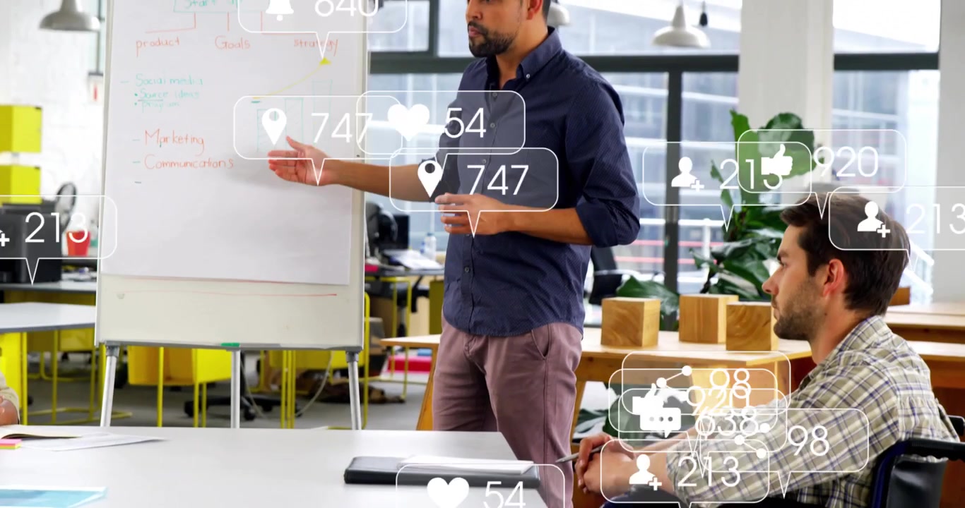 Presenter pointing at flip chart while colleague raising hand causing metrics overlay for business