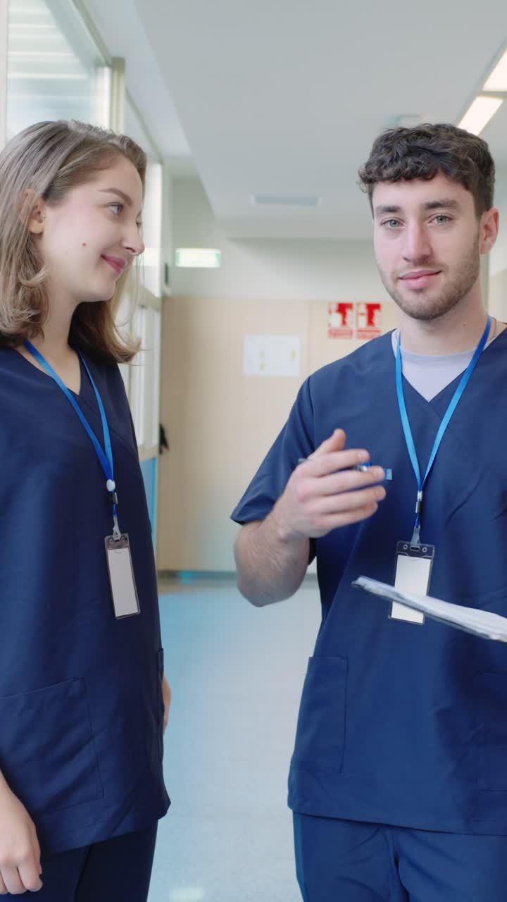 Medical professionals in hospital hallway