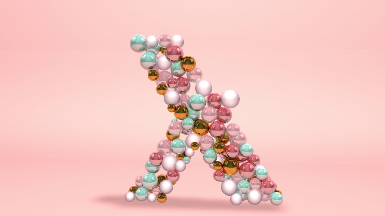 x 문자는 구슬, 유리 공, 파스텔 진주, 크리스탈 보석 및 금으로 만들어졌습니다.