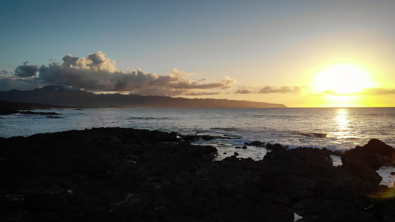 A sunset in Hawaii from the north coast of Oahu.