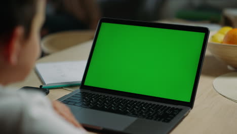 Unknown-boy-using-mockup-laptop-online-lesson.-Schoolboy-answering-questions.