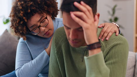 Couple-is-sad,-woman-comforting-man-with-empathy