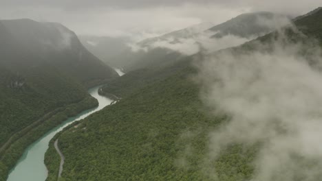 misty mountain valley with winding river