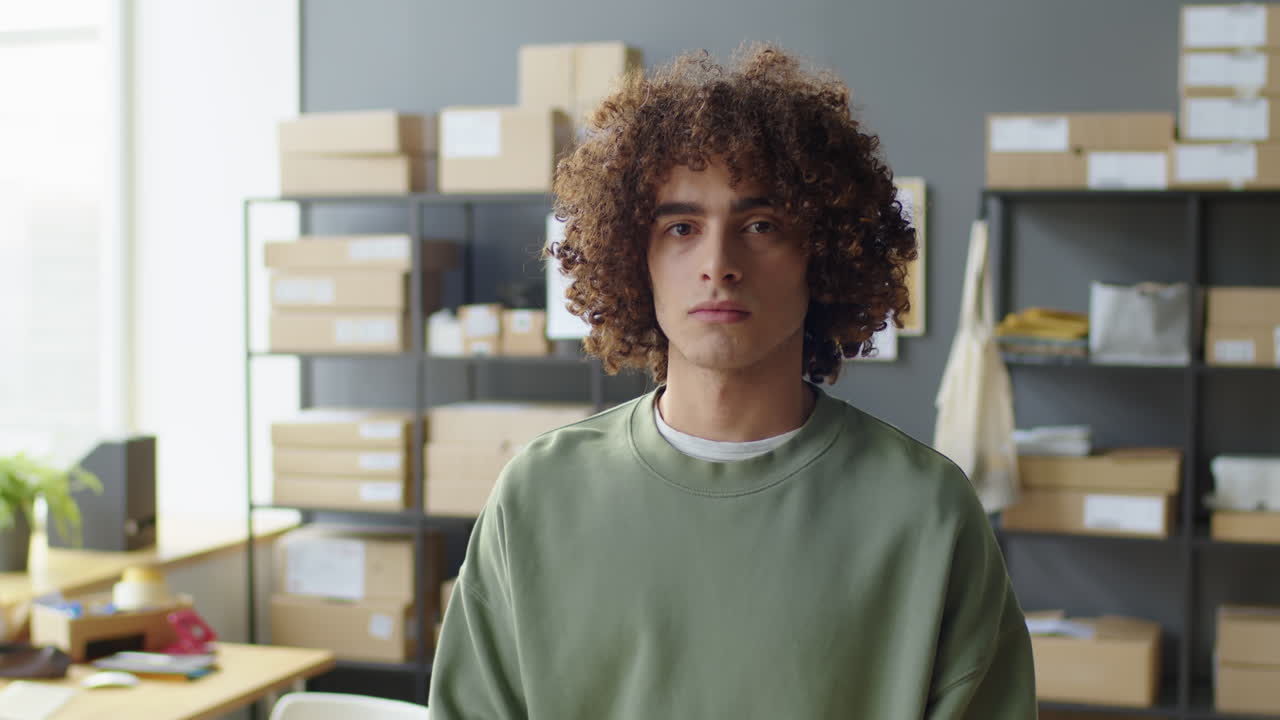 Portrait of a man in a warehouse office