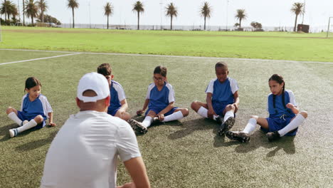 children, leg stretching and sport on soccer field