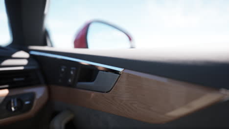 close-up of a car door handle and interior trim