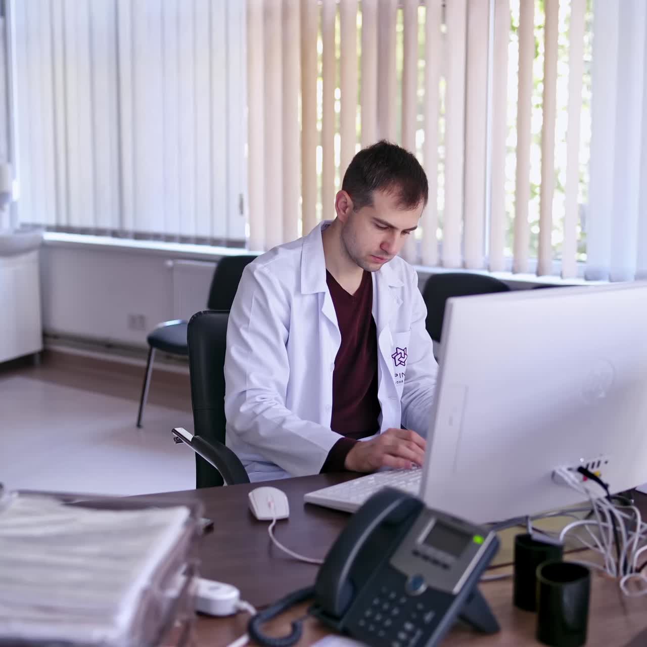 Doctor working with computer