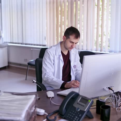 doctor working with computer