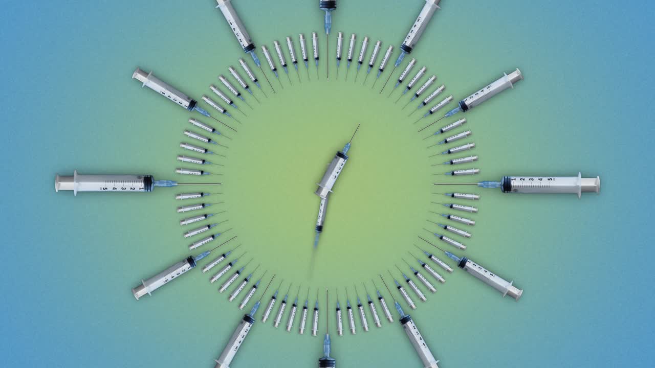 reloj hecho de jeringas de lapso de tiempo