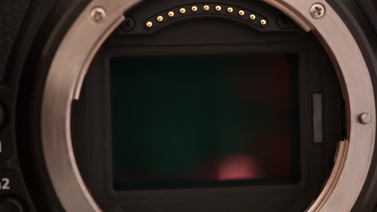 Close up view of a digital camera shutter opening