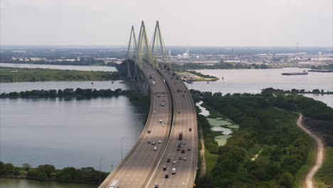 establishing shot of the fred hartman bridge in baytown, texas just outside of houston, texas