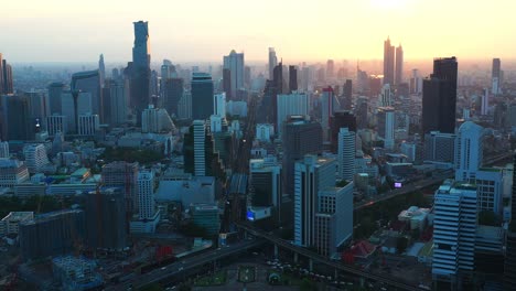 aerial view of sathorn, bangkok downtown. financial district and business centers in smart urban city in asia. skyscraper and high-rise buildings. thailand