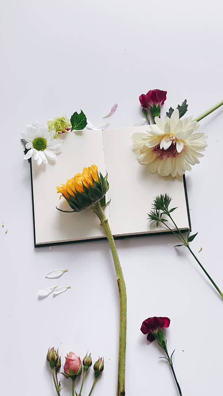 Floral Arrangement on a Blank Book