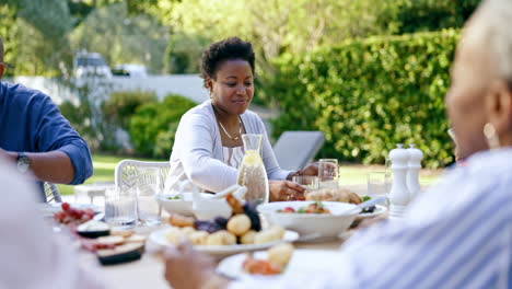 family, lunch outdoor and eating in garden