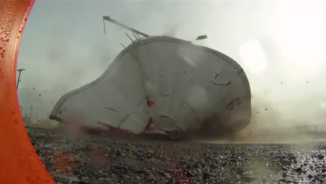 an old water tower is blown up to make way for cleaner energy