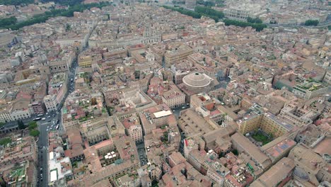 4K-Aerial-of-the-colosseum-and-the-center-of-Rome,-Italy