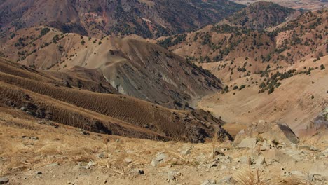 Petroglyphs-in-Central-Asia,-Uzbekistan-view-on-Beldersay-mountains-from-Petrogliphs-stone