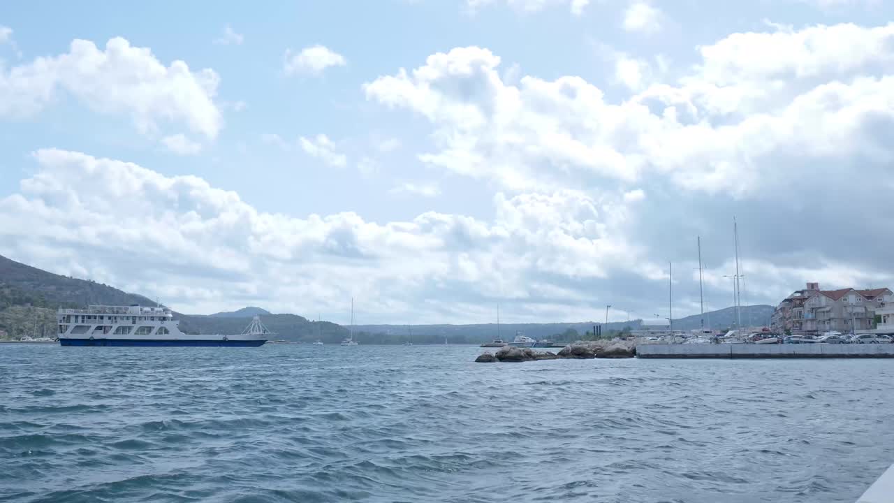 Ferry in a harbor on a sunny day