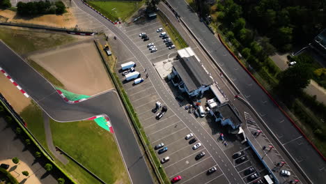 Race-track-and-building-complex-in-Belgium,-aerial-drone-view