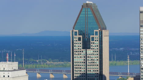 aerial view of montreal skyline with river and bridges