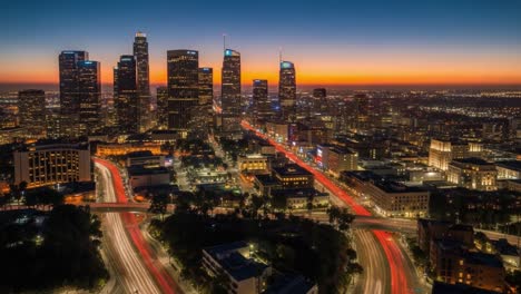 vibrant city skyline at dusk with streaking traffic lights