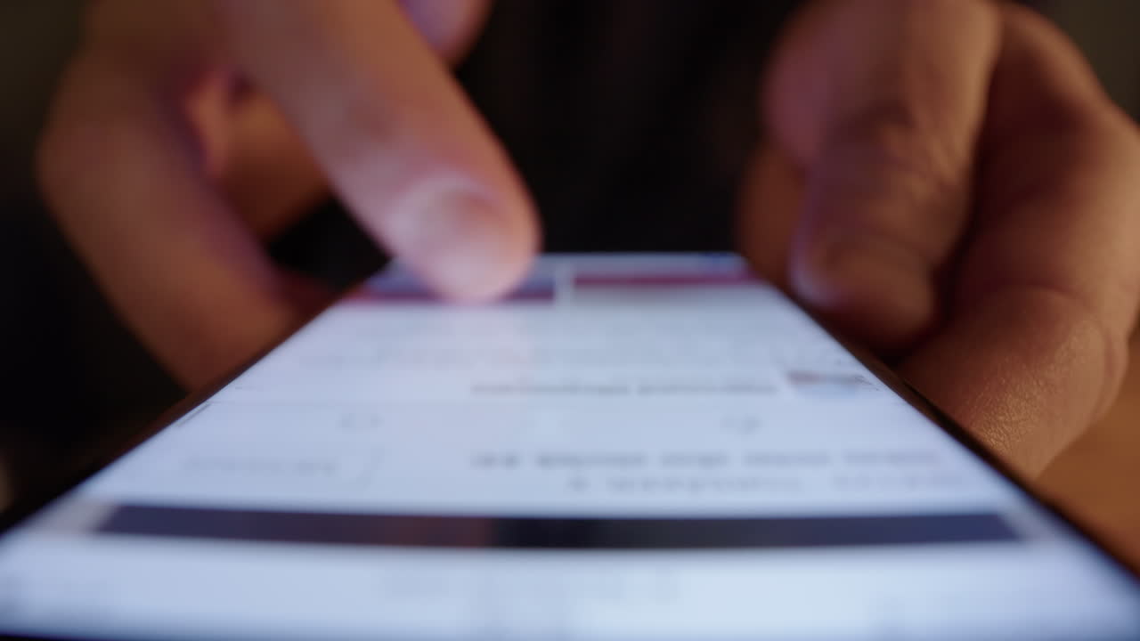 Fingers scrolling mindlessly on smartphone social media app, digital addiction