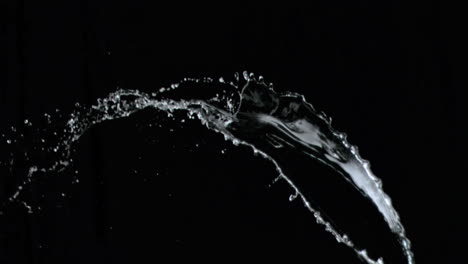 liquid thrown upwards in super slow motion