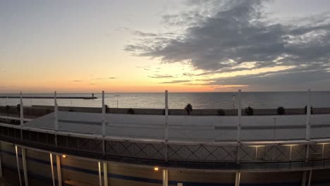 Time-lapse-sunrise-from-cruise-ship-docked-in-Barcelona,-Spain