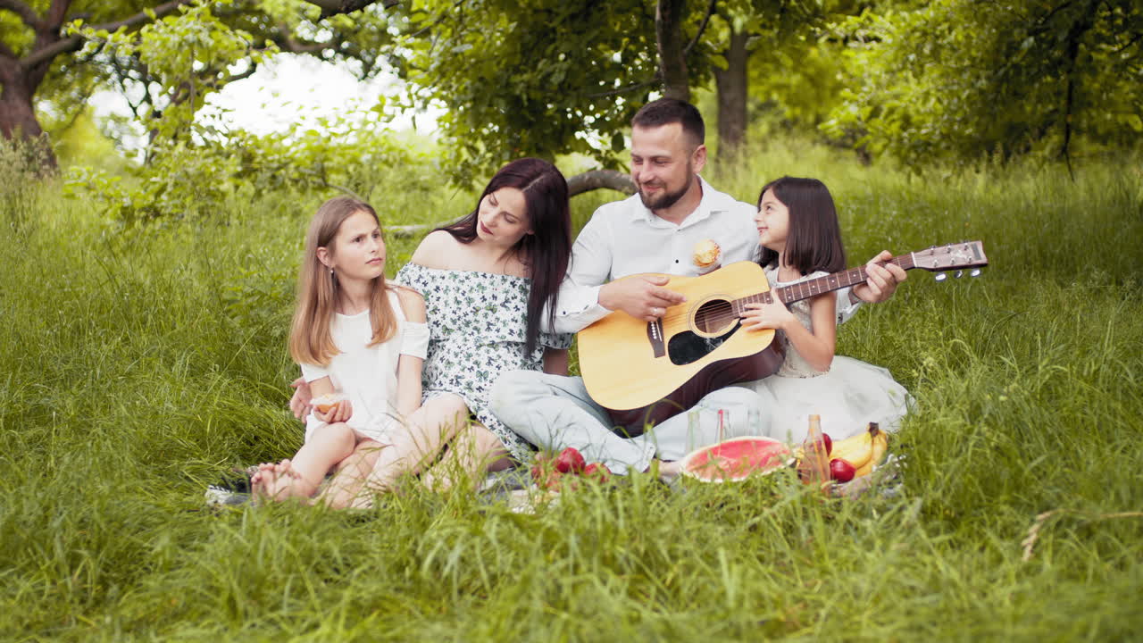 Familie Picnic i en park