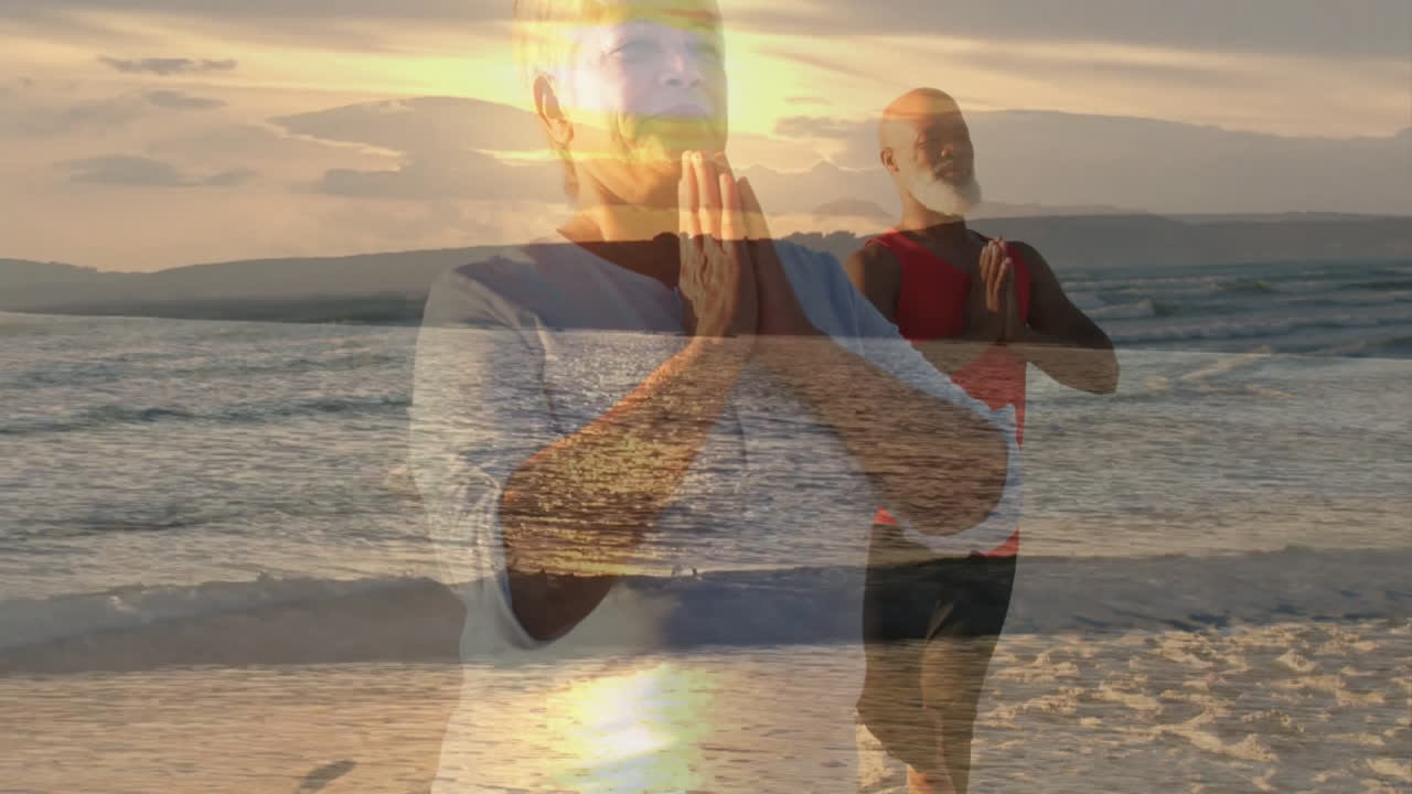 Yoga partners practicing meditation on beach at sunset, with animated health icons and wave charts