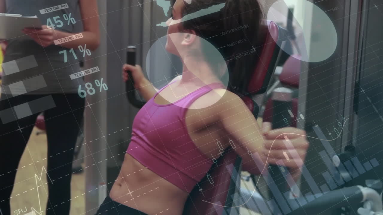 Trainer holding tablet monitoring client pulling machine handles in gym, adding animated heart icon