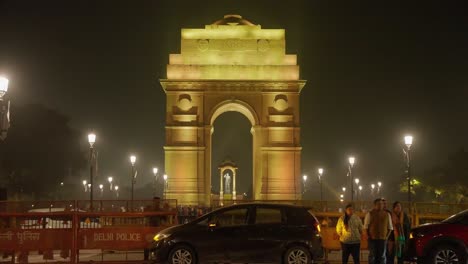 delhi people at night near india gate