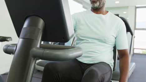 video of senior african american men is exercising at the gym